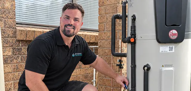Caspar from Brisbane Flow Plumbing servicing a Rheem hot water system
